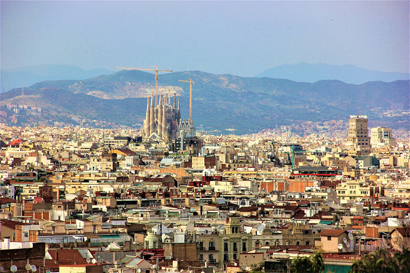  View across the rooftops of Barcelona to the Sagrada Familia